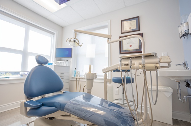Dentist holding intraoral camera