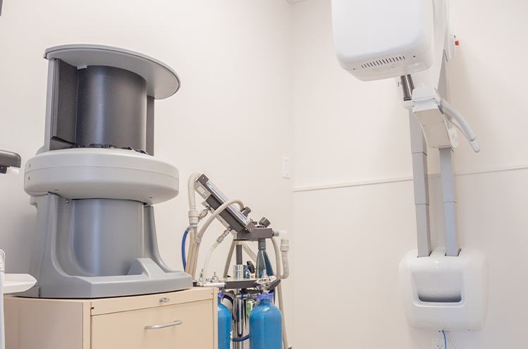 Dentist looking at digital x-rays