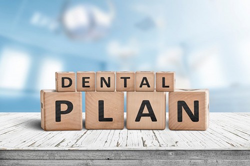 Blocks spell “dental plan”