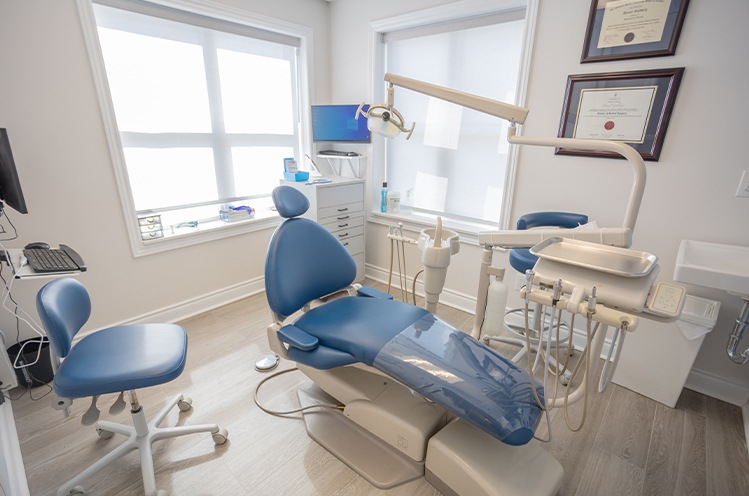 Woman smiling during Family dentistry checkup and teeth cleaning visit