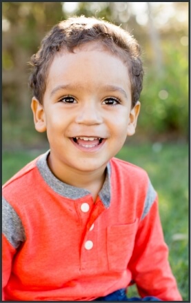 Child with healthy smile after children's dentistry