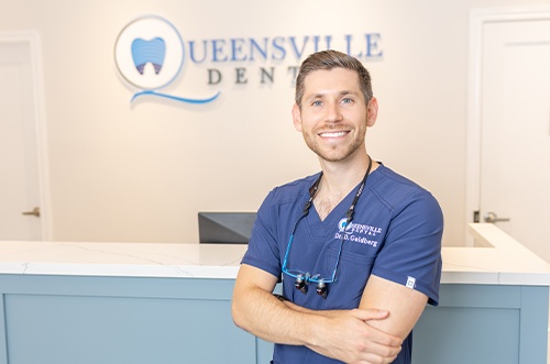 man talking with dentist for teeth whitening in East Gwillimbury