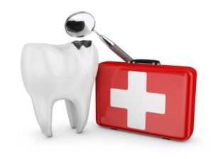 a tooth in front of an emergency kit